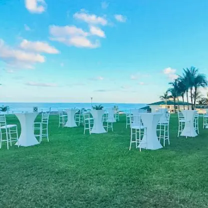 Cocktail reception setup on the Miramar Garden lawn at Iberostar Selection Cancun