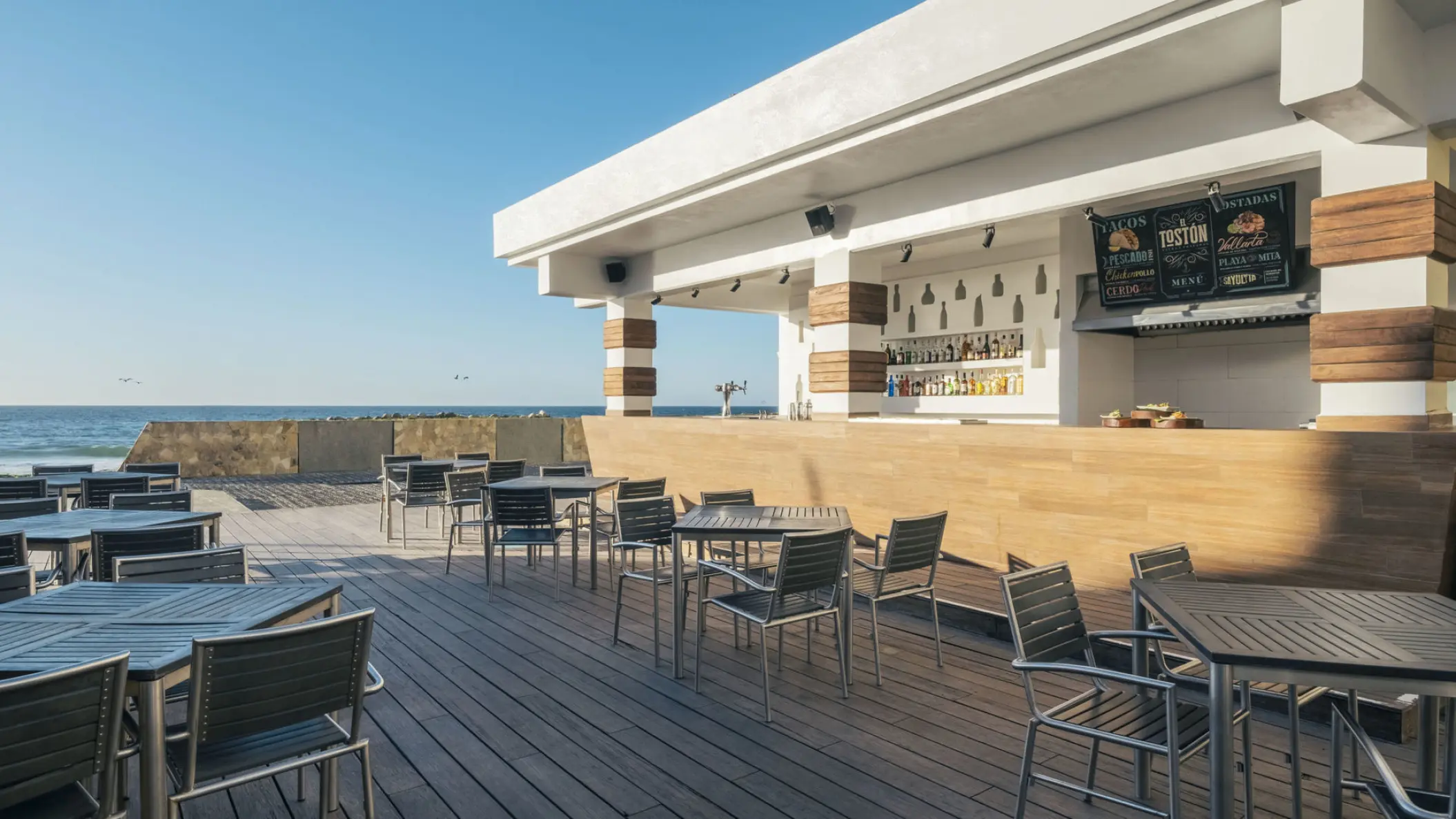 Outdoor bar terrace with ocean views at Iberostar Selection Playa Mita, Puerto Vallarta