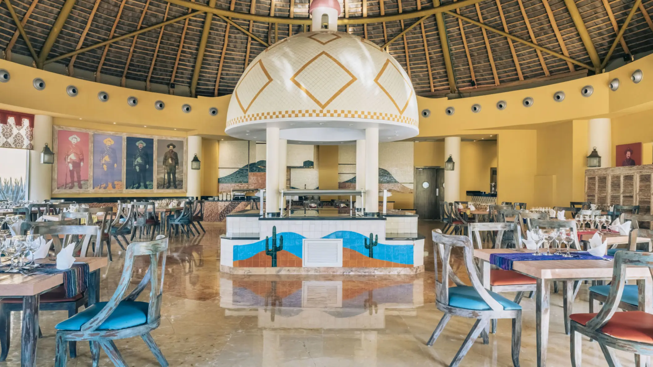 Buffet dining area under a thatched dome at Iberostar Selection Playa Mita, Puerto Vallarta