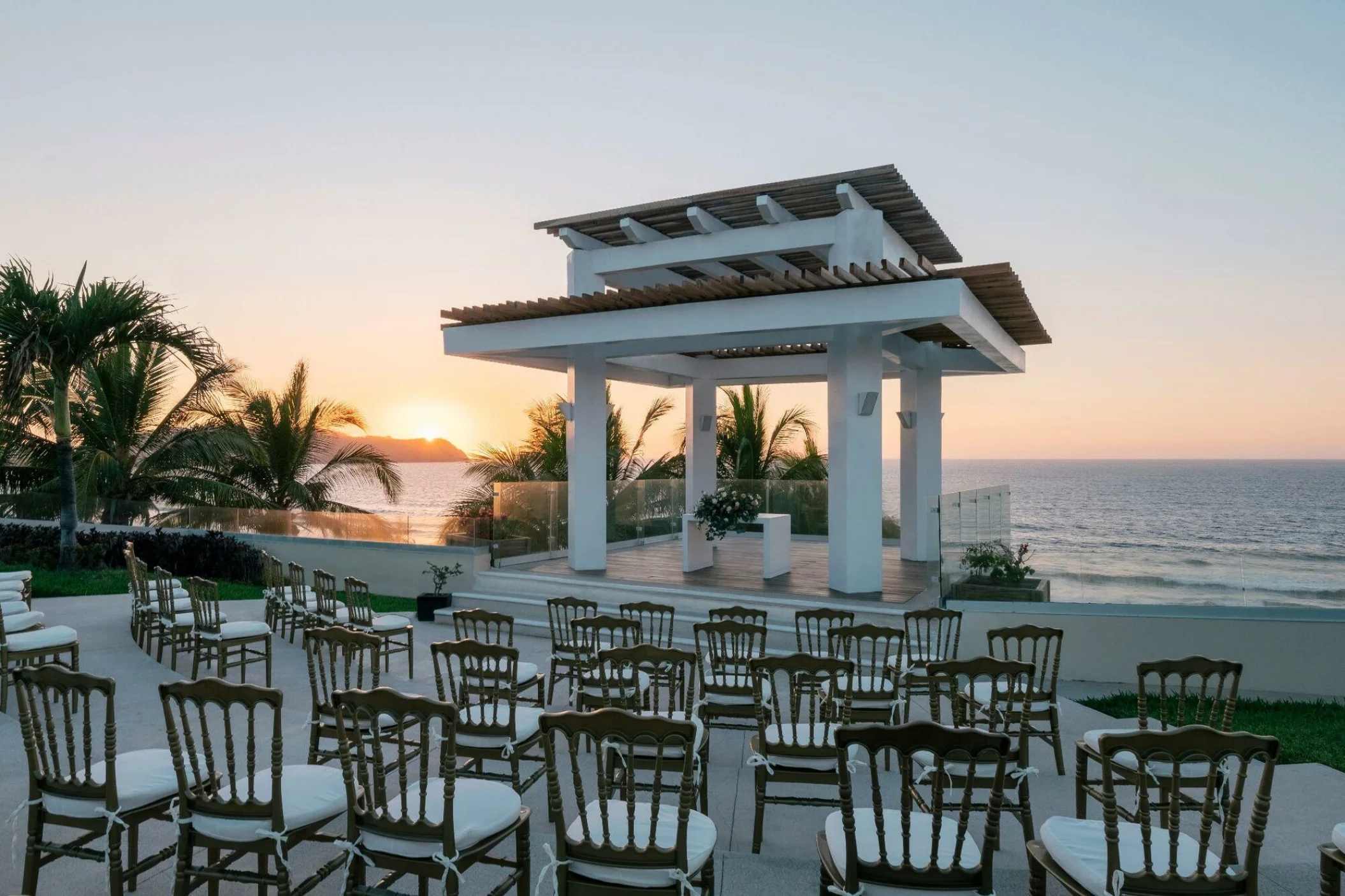 Ceremony decor on the white sand gazebo at Iberostar Selection Playa Mita