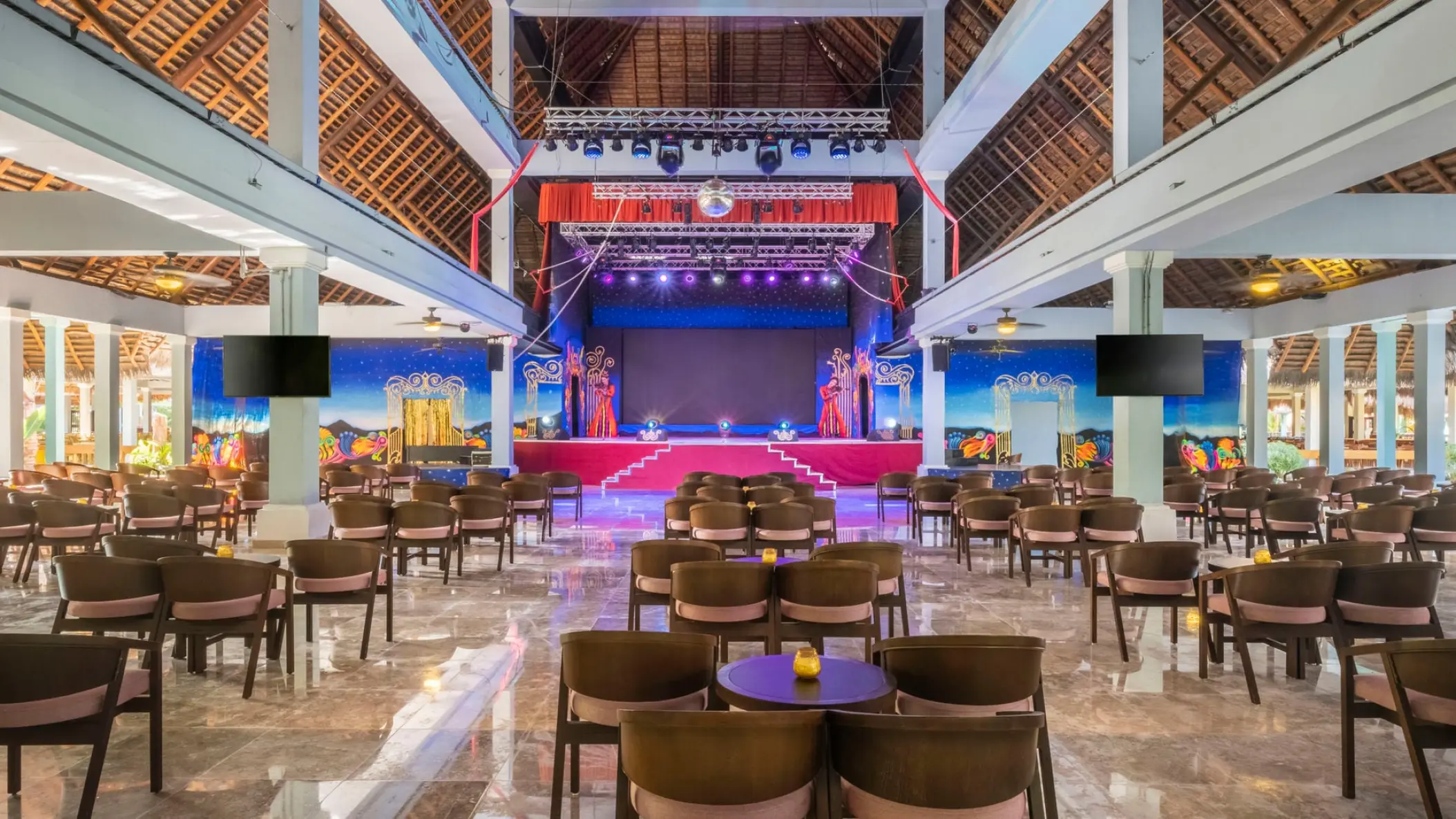 Indoor theater and performance stage with seating at Iberostar Waves Tucan, Playa Del Carmen