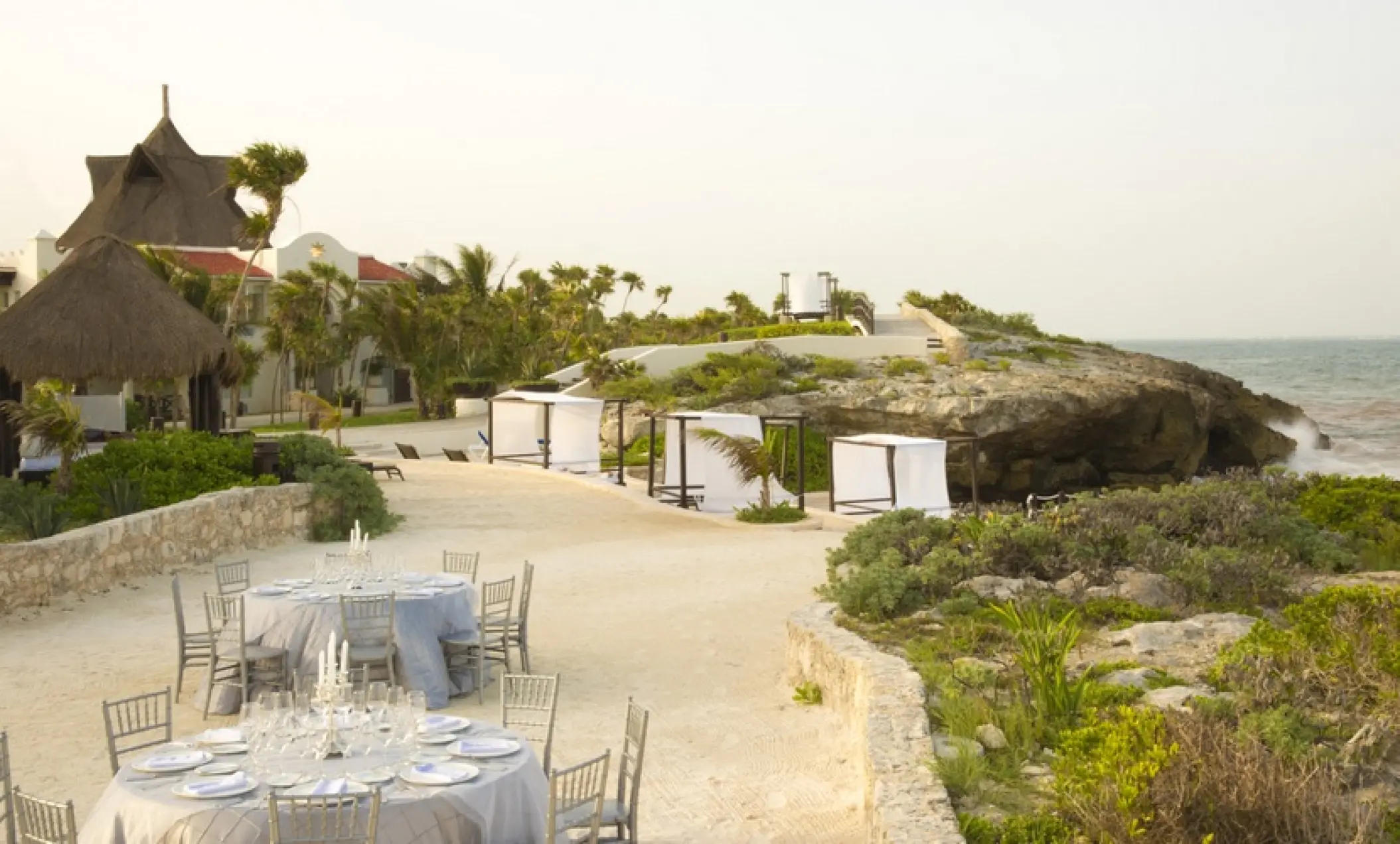 Outdoor wedding reception setup on the terrace at Kore Tulum, Tulum