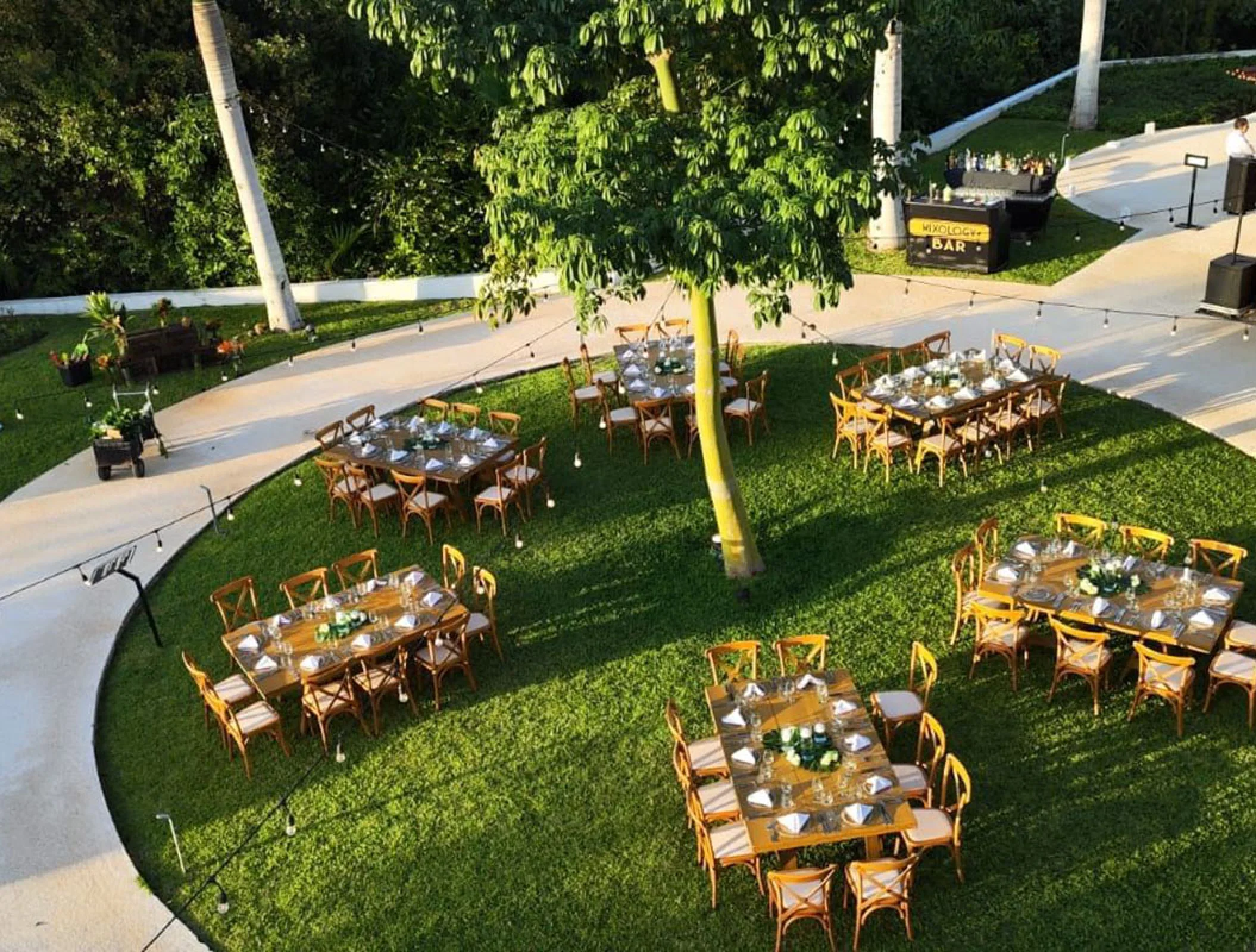 Reception setup overview in La Ceiba Garden venue at Haven Riviera Cancun Resort.