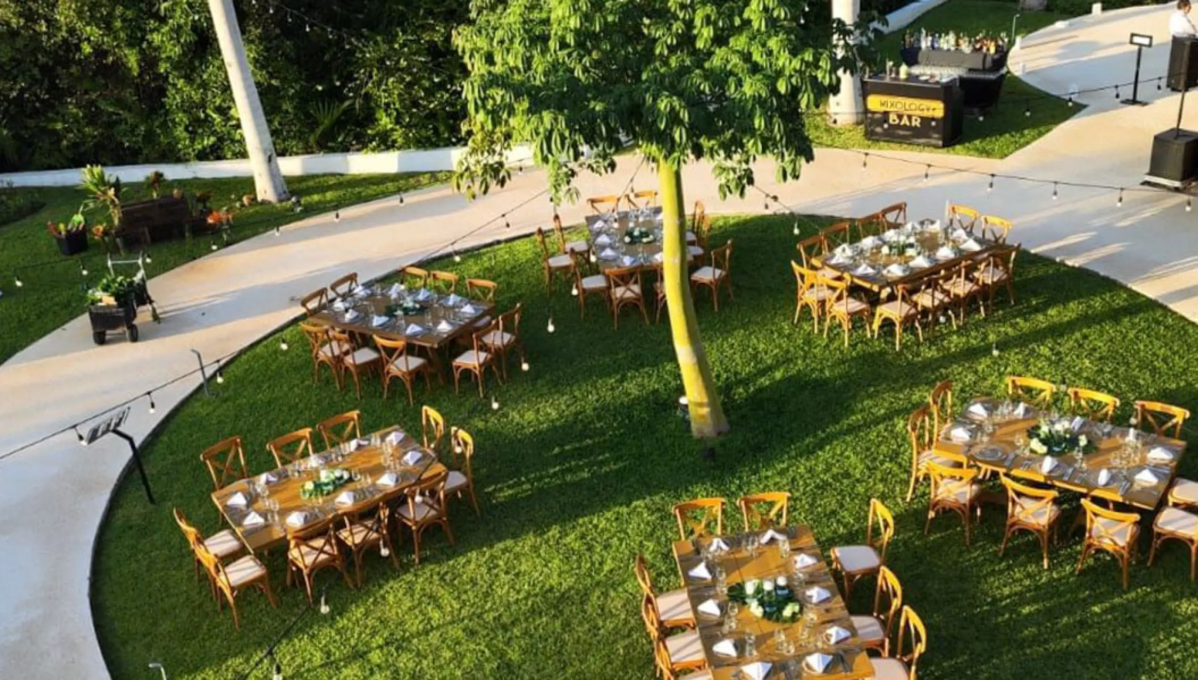 Reception setup overview in La Ceiba Garden venue at Haven Riviera Cancun Resort.