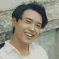 Paradise Weddings planner smiling while wearing a white shirt