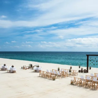 Ceremony decor on the blanc beach wedding venue at Le Blanc Spa Resort Los Cabos