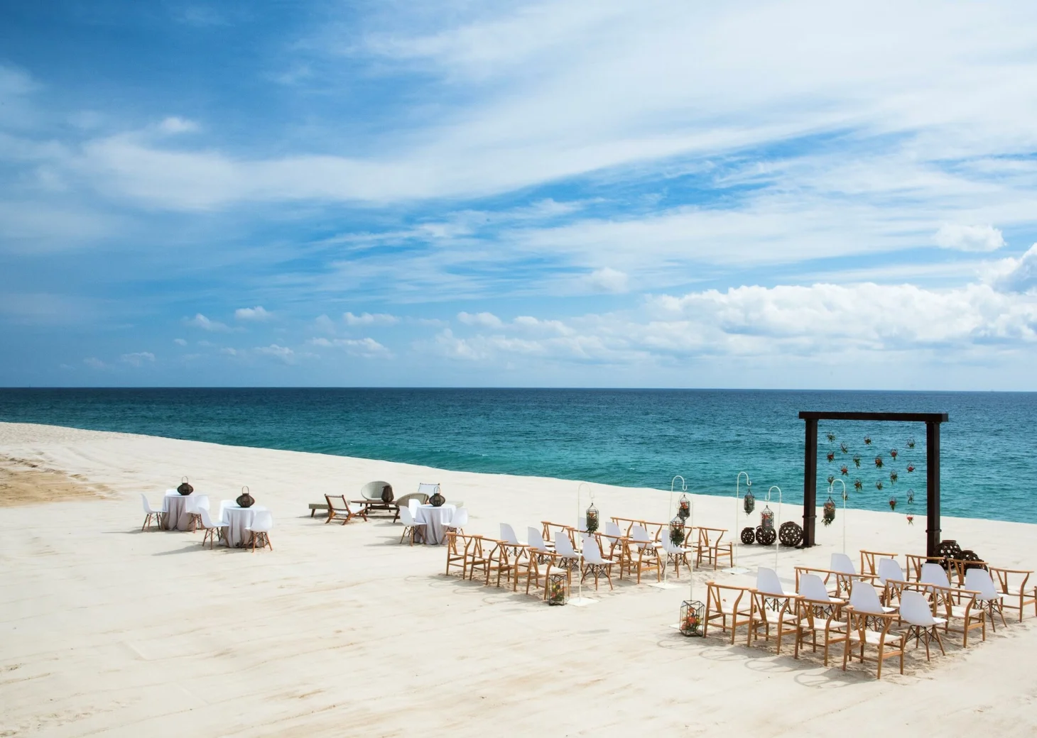 Ceremony decor on the blanc beach wedding venue at Le Blanc Spa Resort Los Cabos
