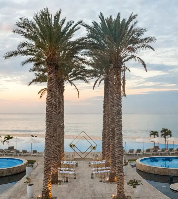 Terrace wedding ceremony setup by the pool at Le Blanc Los Cabos, Cabo San Lucas