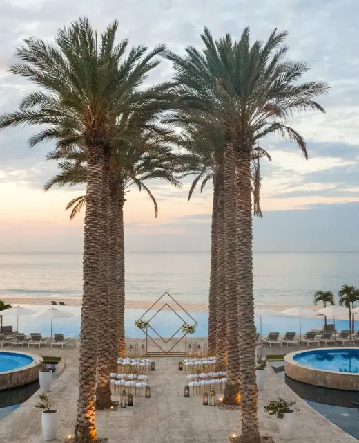 Ceremony decor on Pool terrace wedding venue at Le Blanc Spa Resort Los Cabos