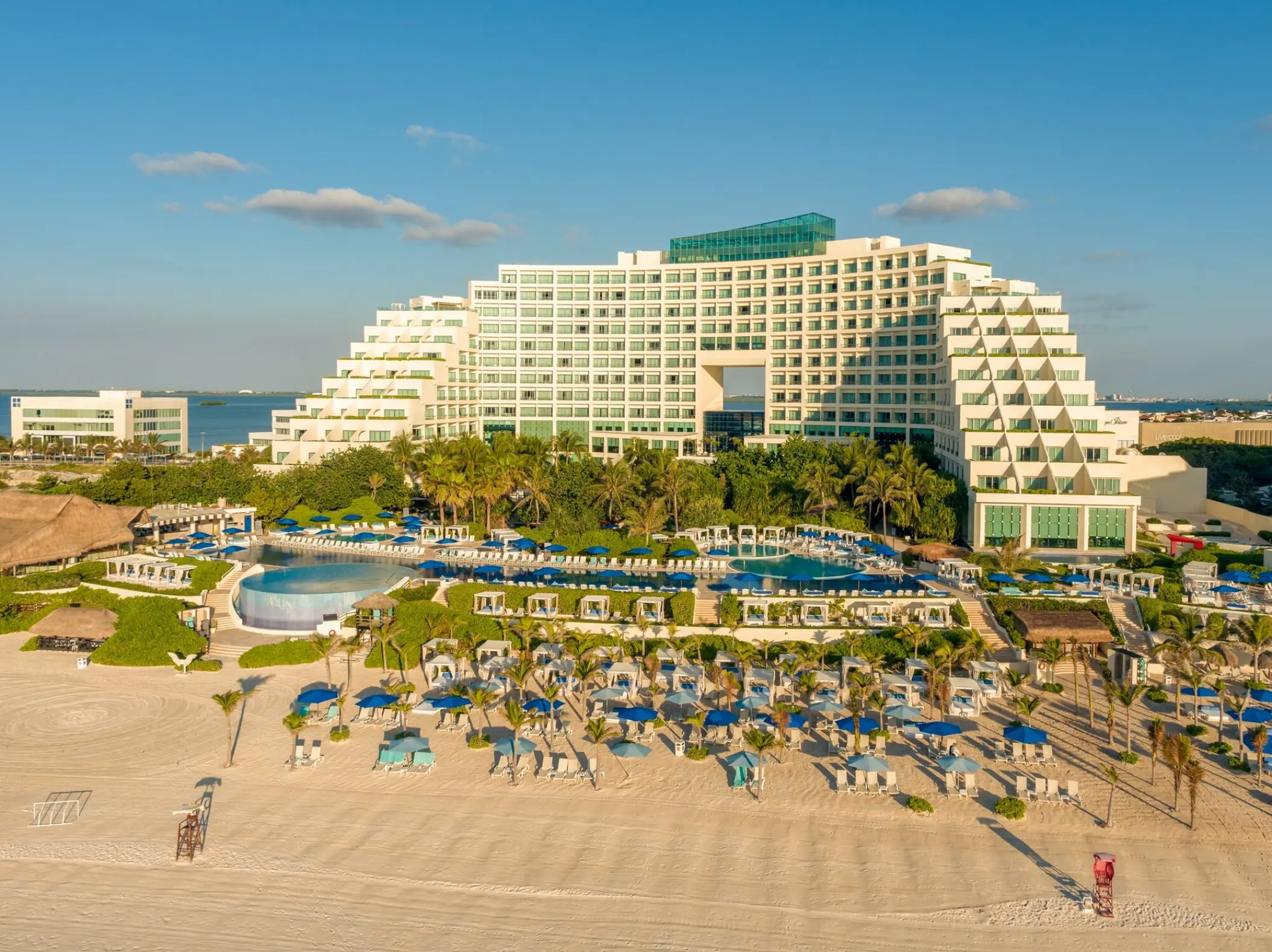 Aerial view of Live Aqua Cancun exterior and beachfront pool area, Cancun