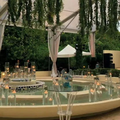 Wedding reception setup at the Garden of the Senses fountain in Live Aqua Beach Resort, Cancun