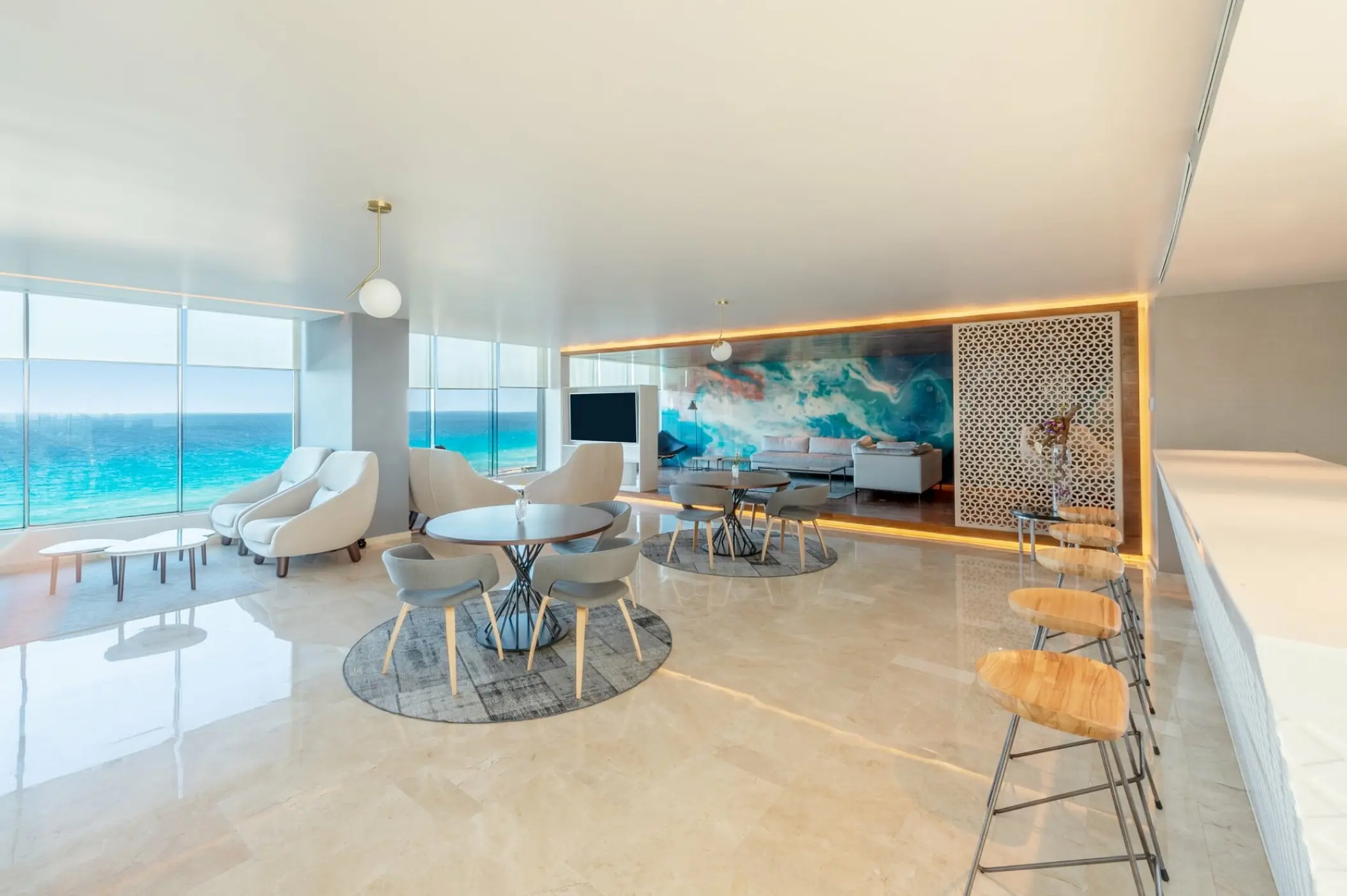 Modern Aqua Club lounge with ocean views at Live Aqua Beach Resort, Cancun