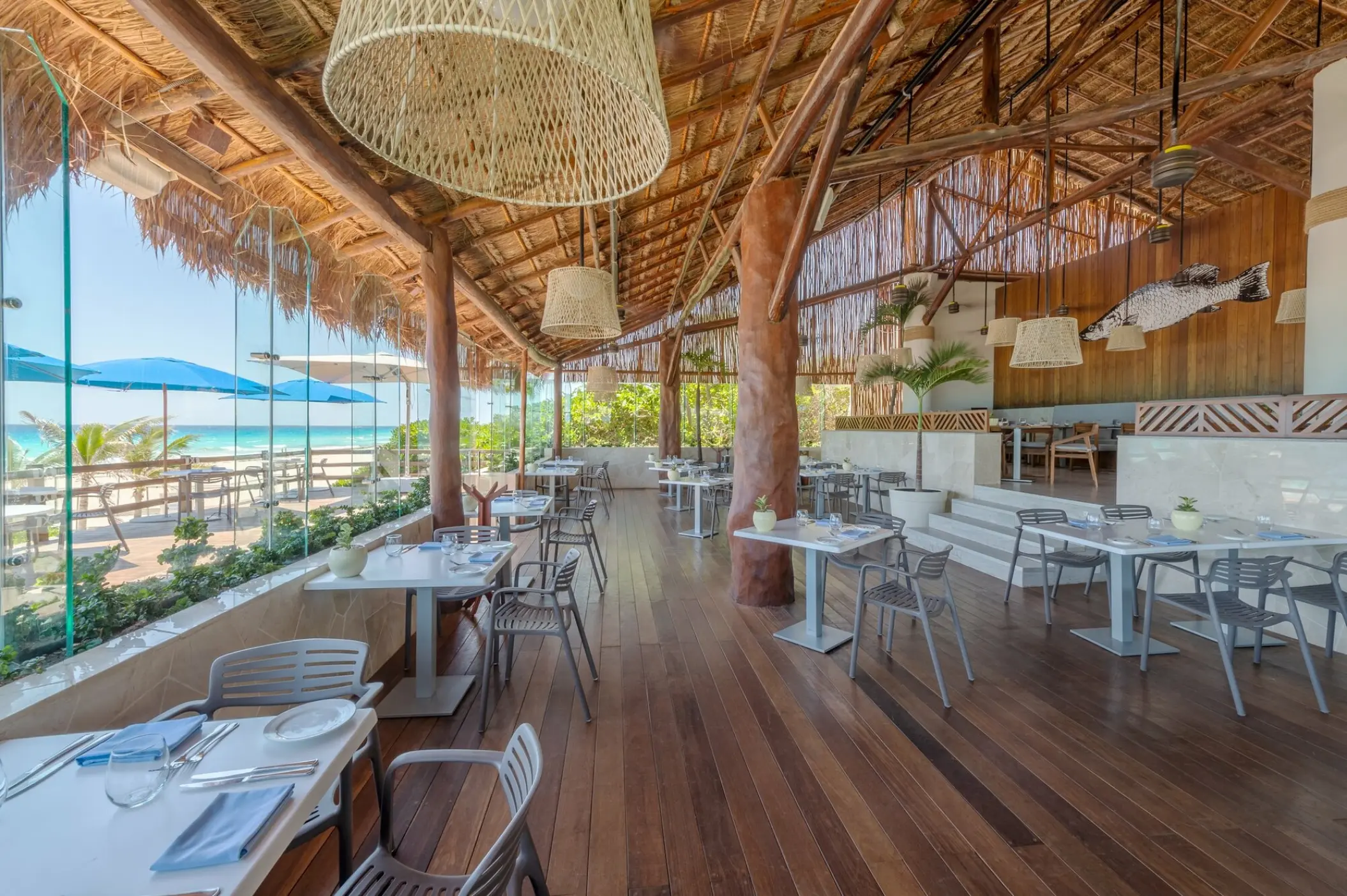 Azur restaurant with thatched roof and ocean views at Live Aqua Cancun, Cancun