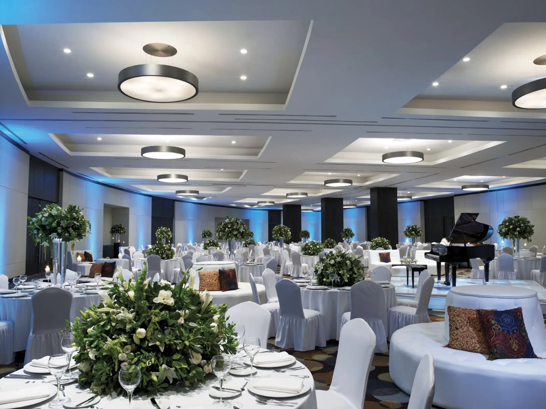 Ballroom wedding reception setup with green centerpieces at Live Aqua Cancun, Cancun
