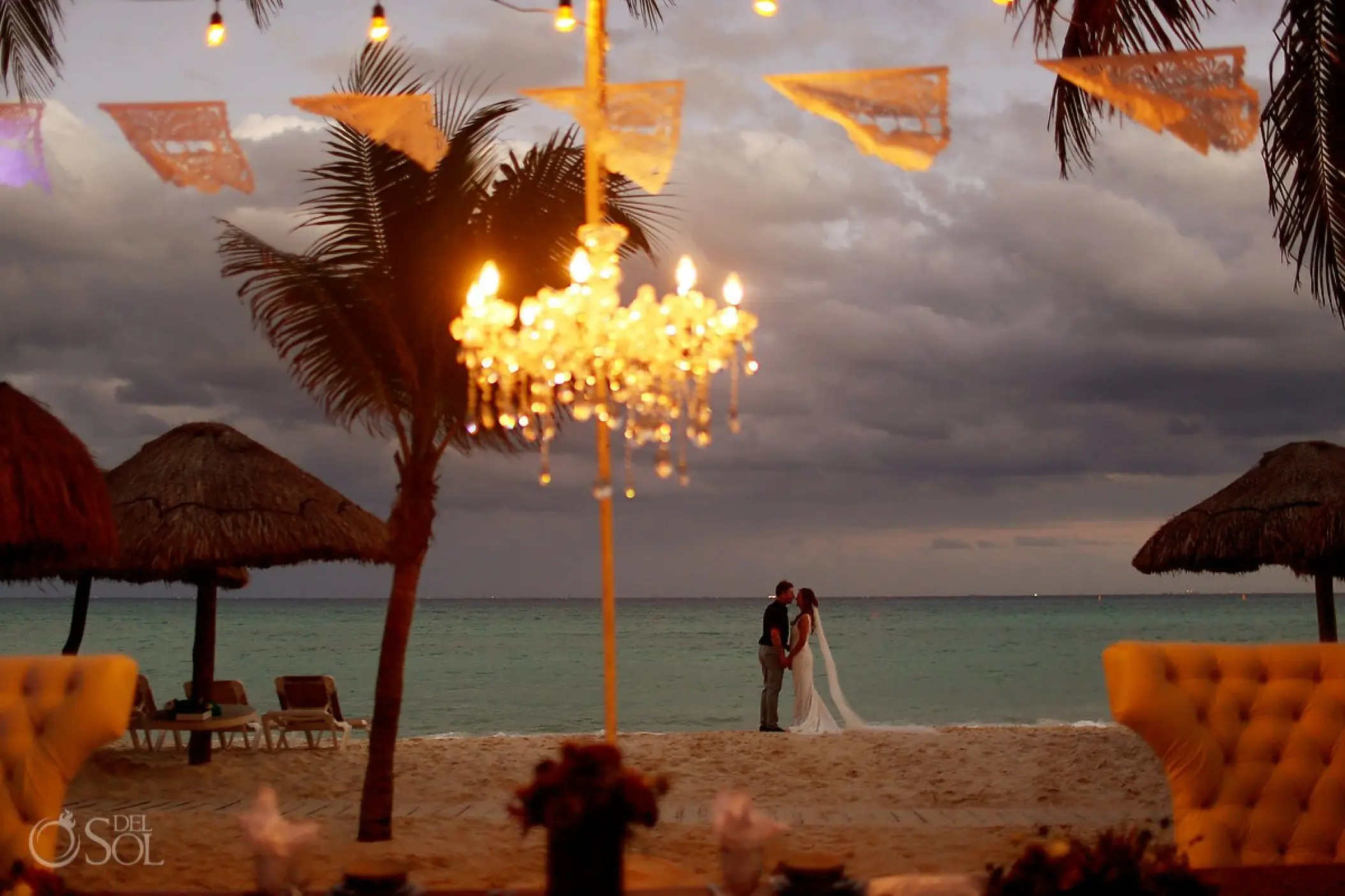The bride and groom on the beach at Mahekal Beach Resort, Playa Del Carmen
