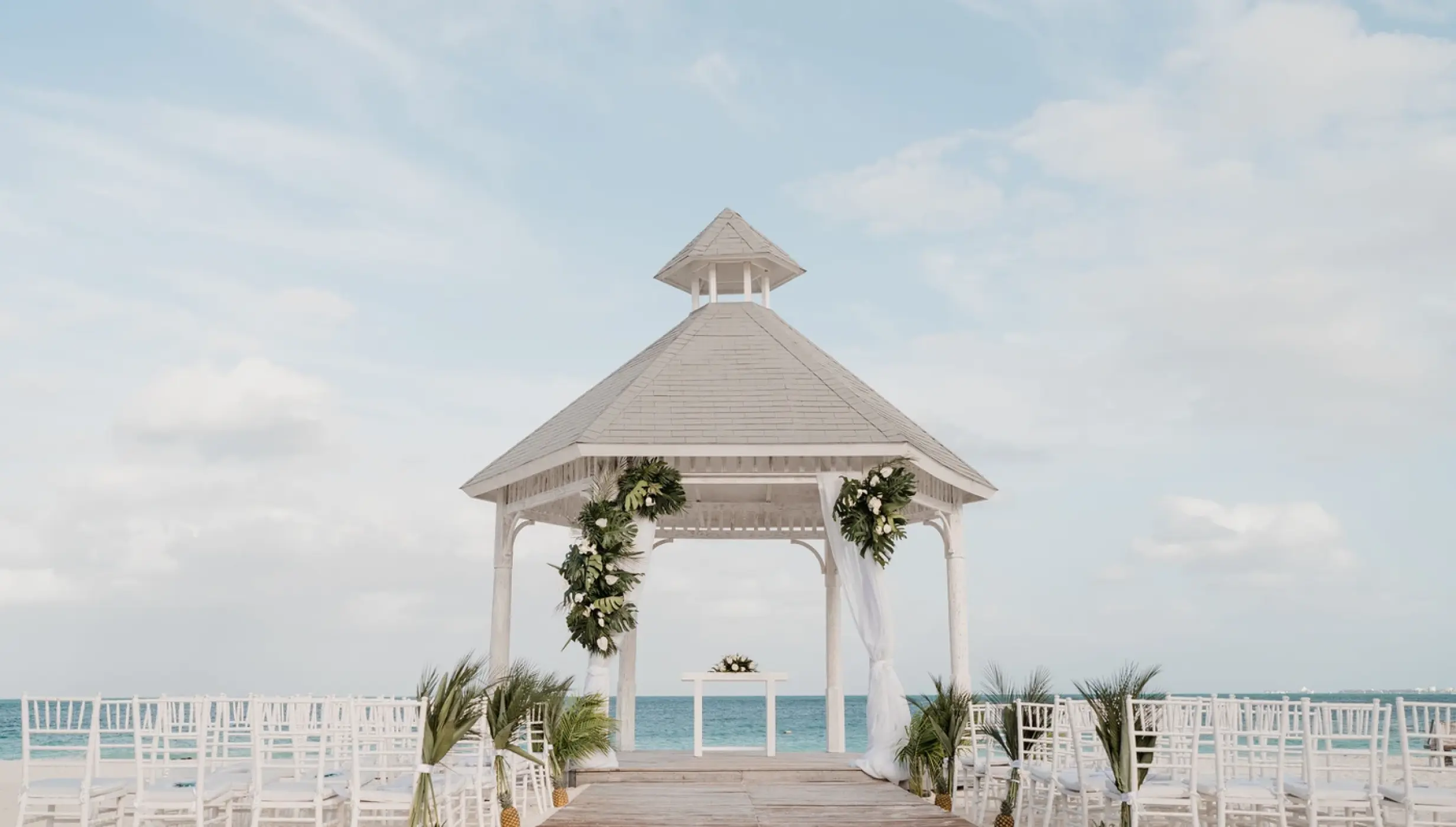Wedding ceremony in Beach gazebo at Majestic Elegance Costa Mujeres