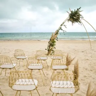 Beachfront wedding ceremony setup at Majestic Elegance Costa Mujeres, Cancun