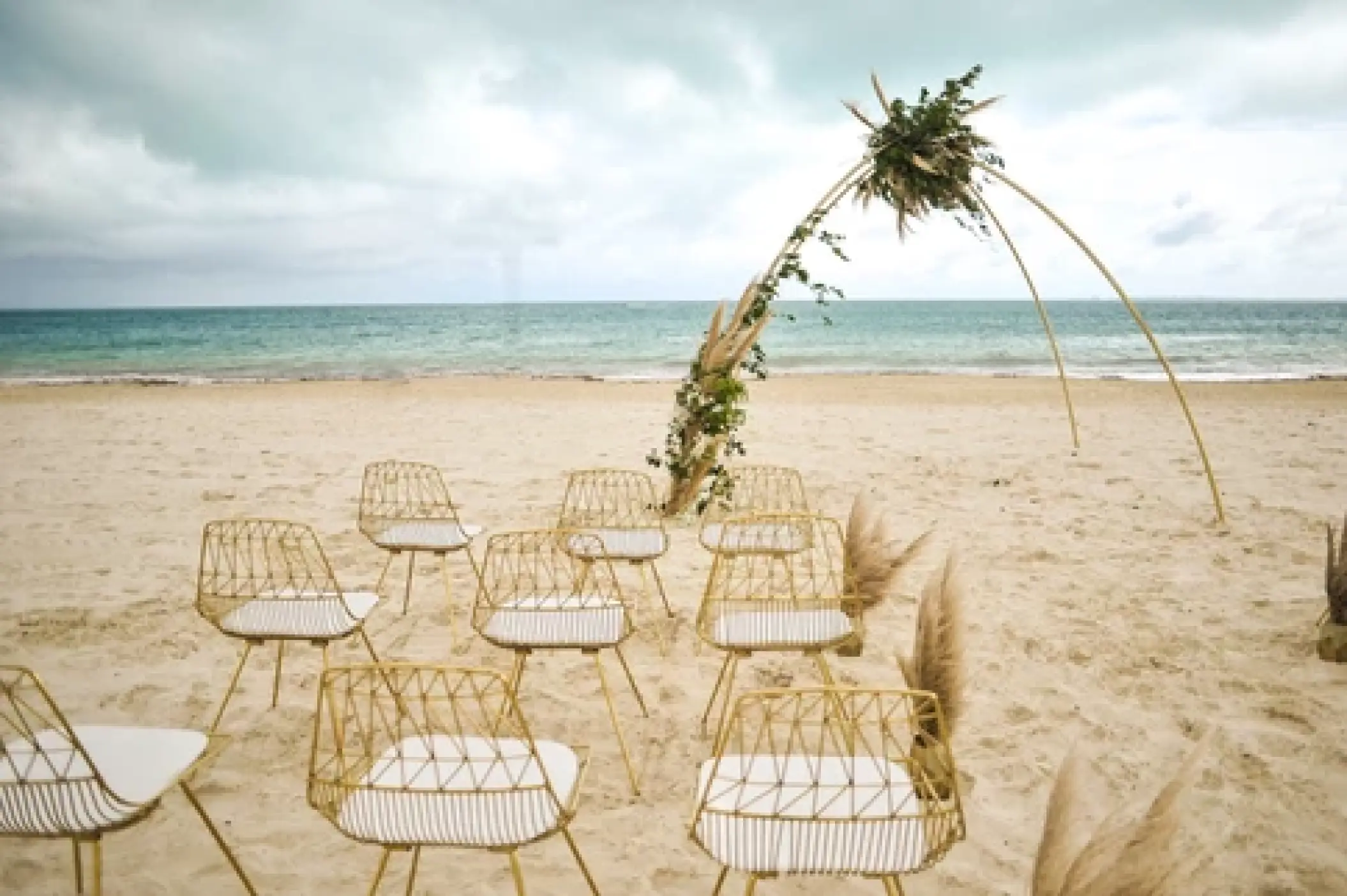 Beachfront wedding ceremony setup at Majestic Elegance Costa Mujeres, Cancun