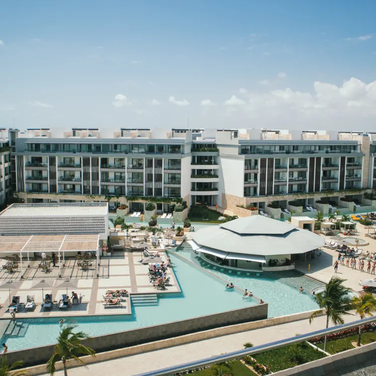 Elevated view of the swimming pools and modern buildings at Majestic Elegance Costa Mujeres, Cancun