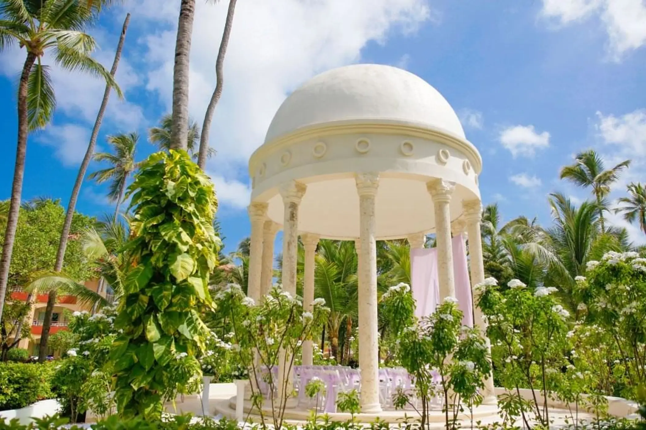 White garden gazebo wedding ceremony venue at Majestic Elegance Punta Cana