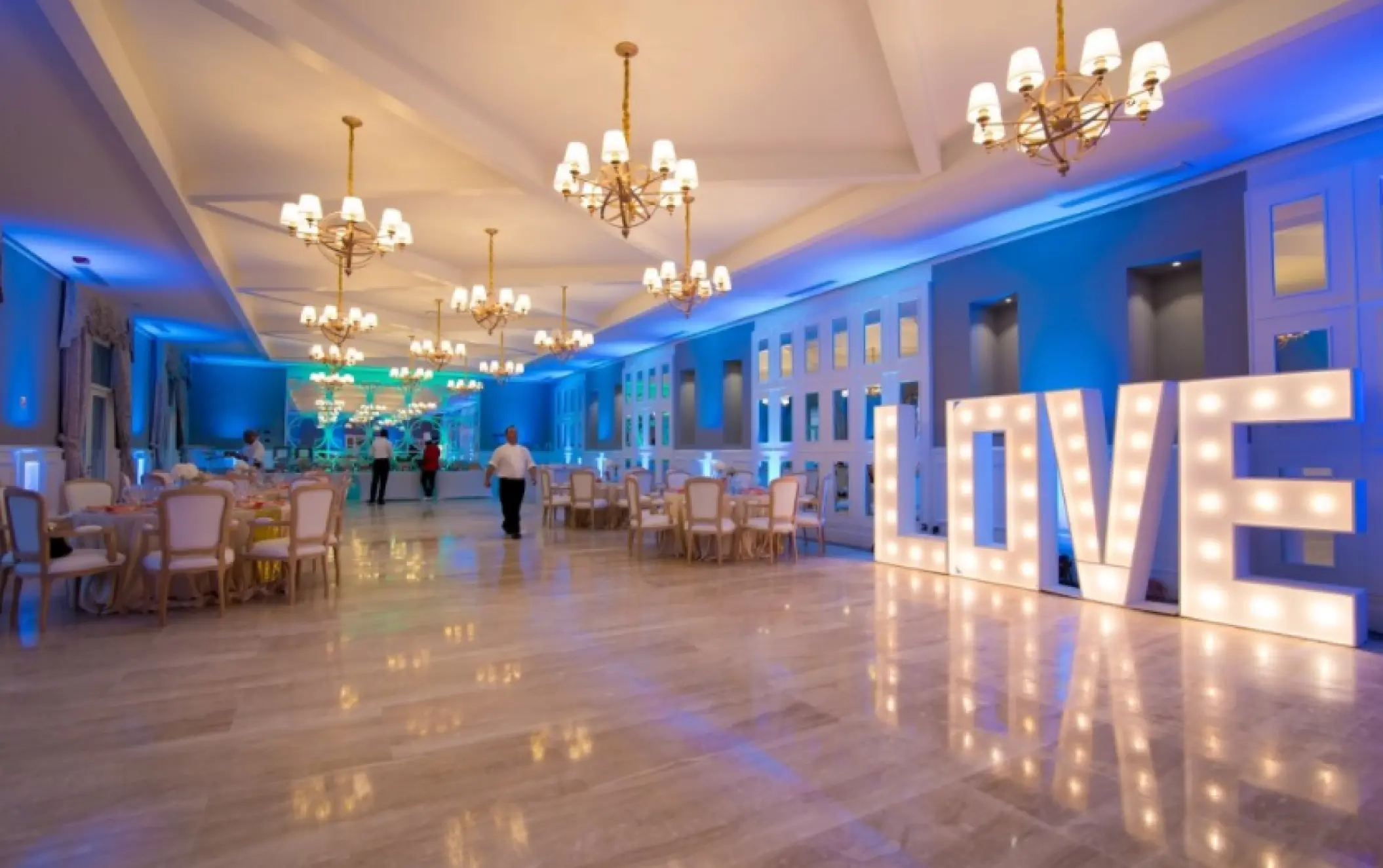 Indoor wedding reception with lighted LOVE letters at Majestic Mirage, Punta Cana