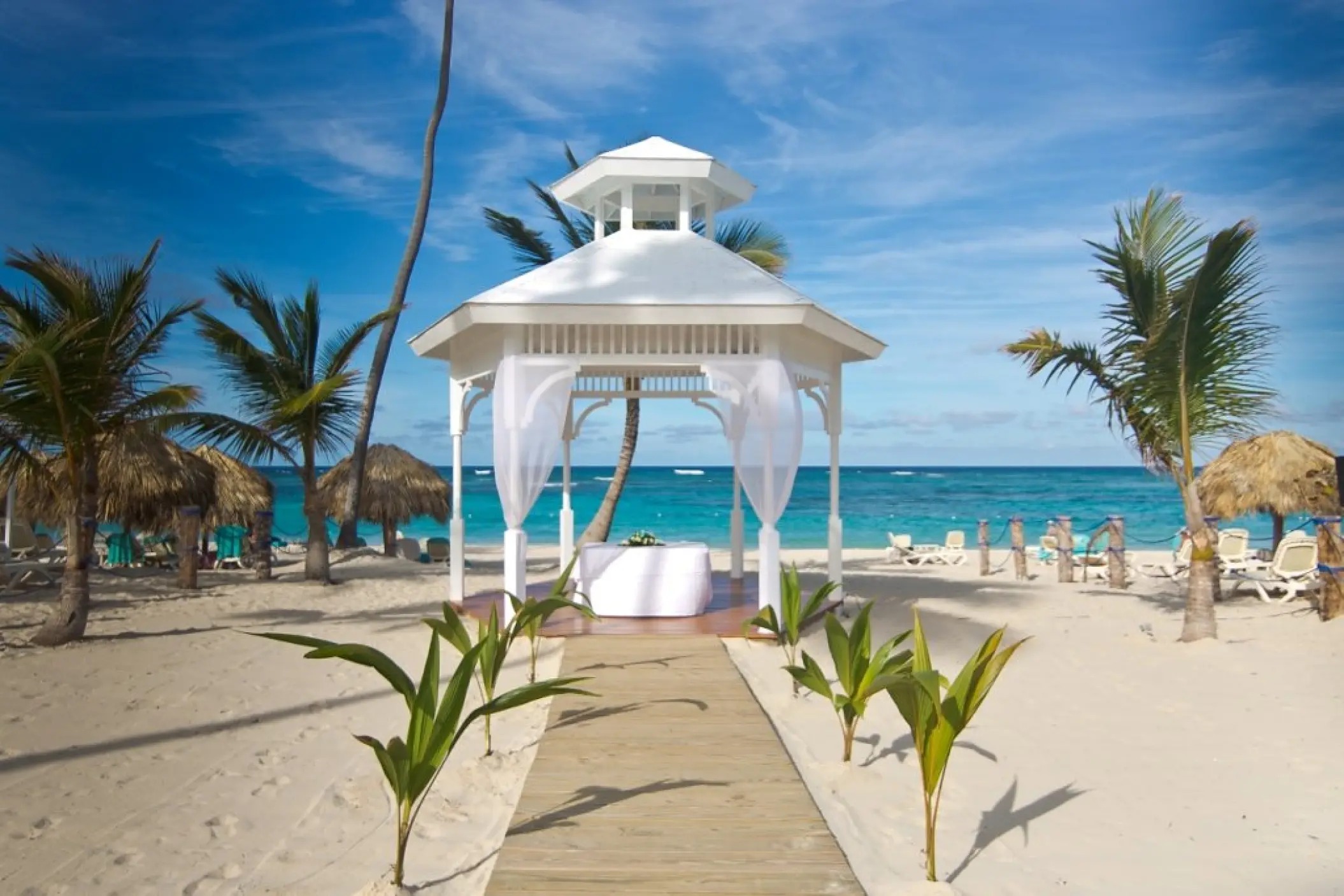 Beachfront wedding gazebo with white draping at Majestic Mirage, Punta Cana