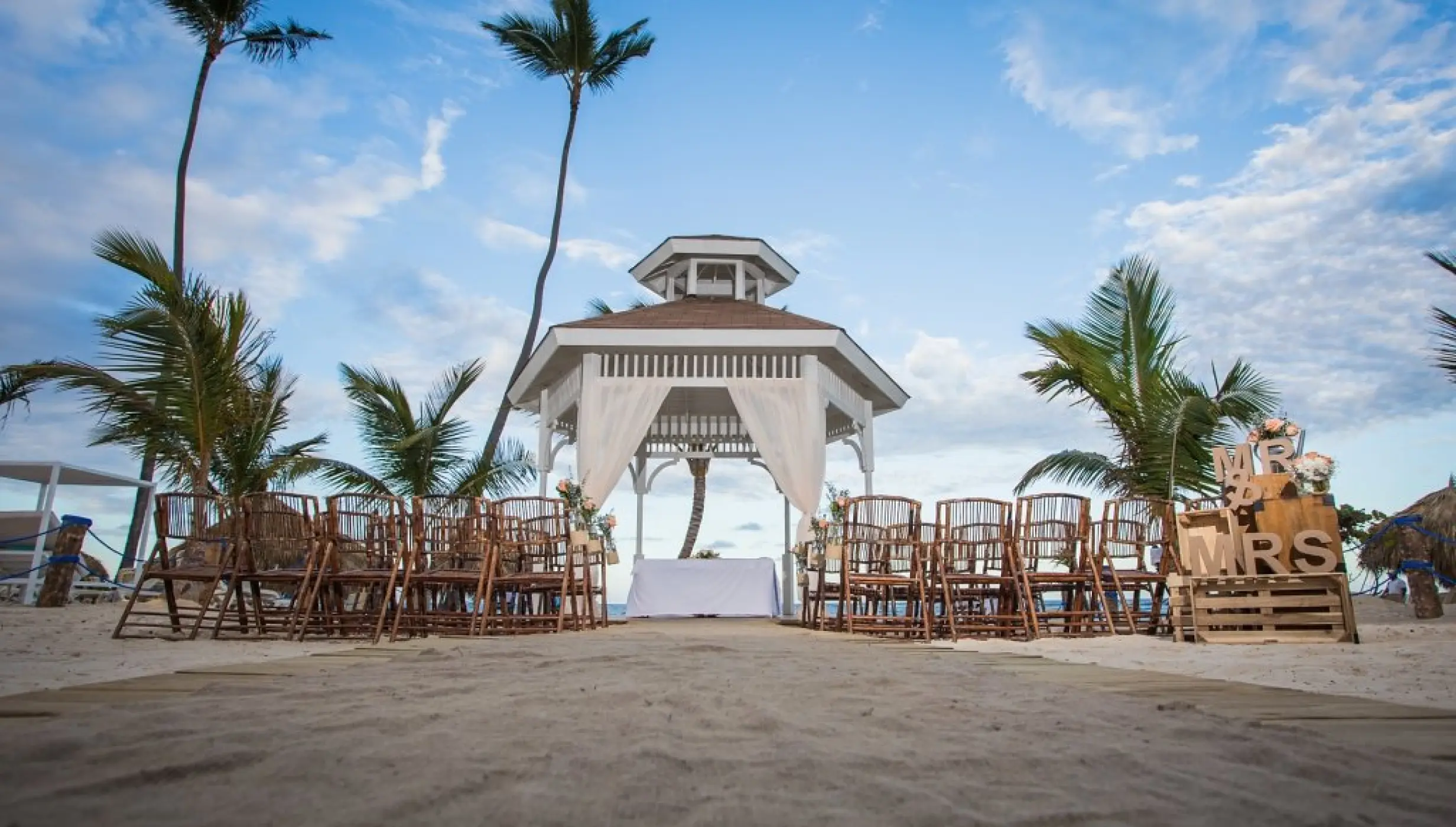 Beach gazebo wedding ceremony setup at Majestic Mirage, Punta Cana