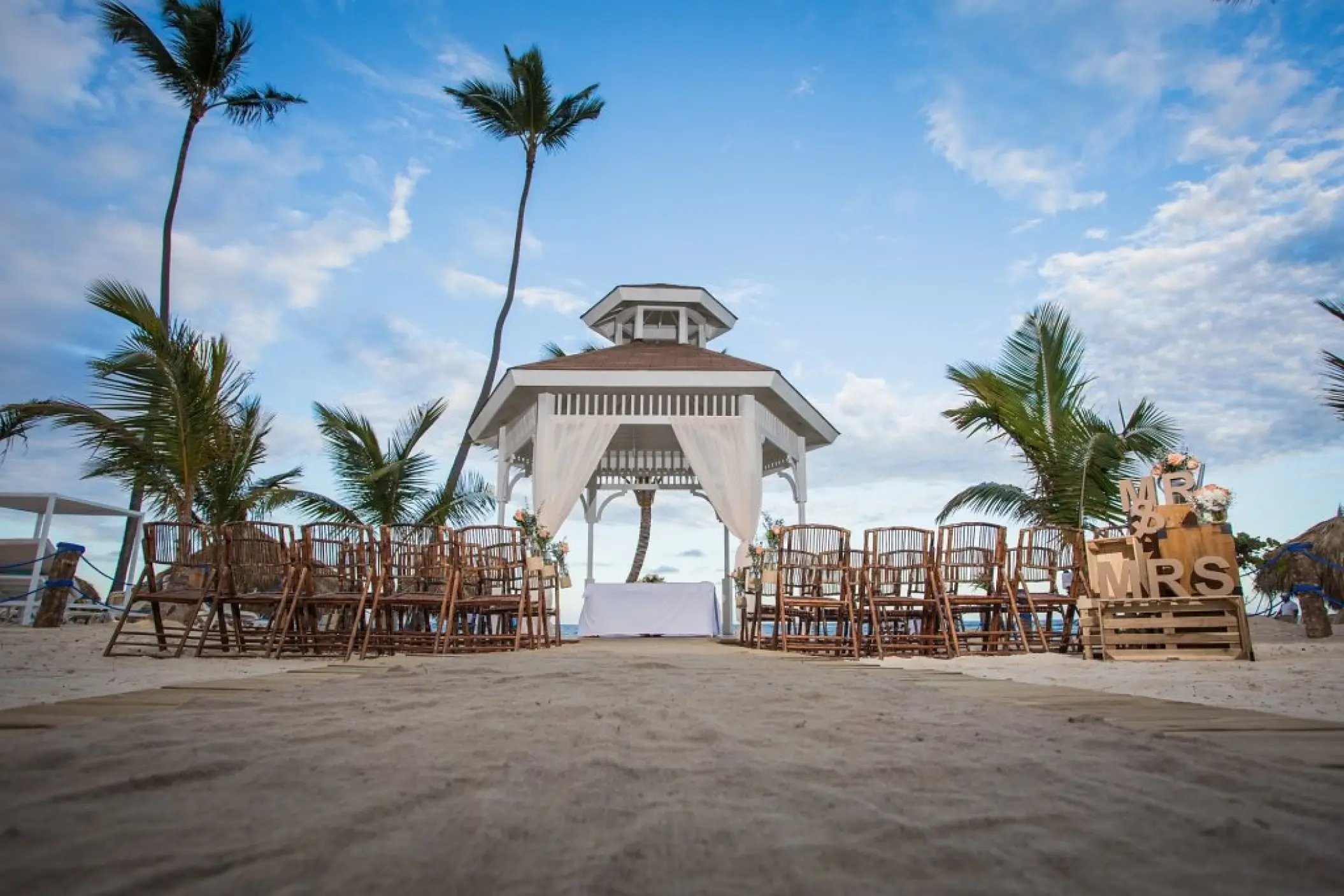 Beach gazebo wedding ceremony setup at Majestic Mirage, Punta Cana