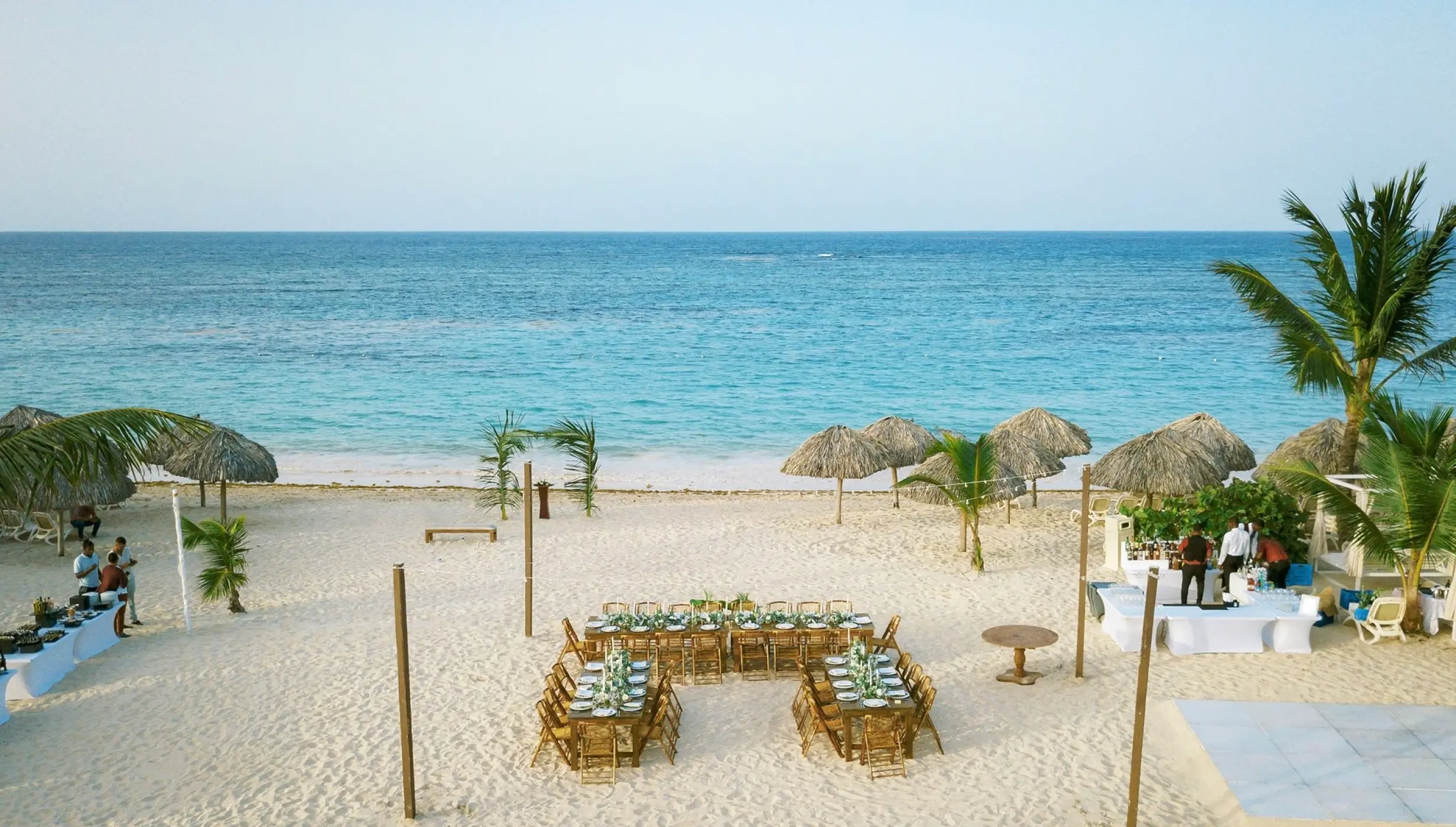 Beachfront wedding reception setup on the sand at Majestic Mirage, Punta Cana