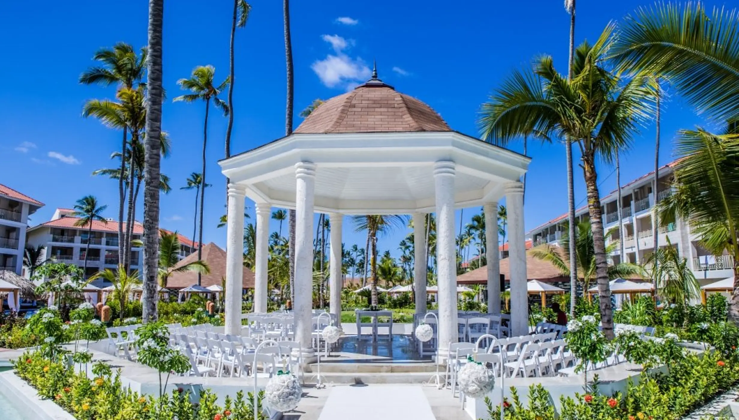 White garden gazebo wedding ceremony setup at Majestic Mirage, Punta Cana