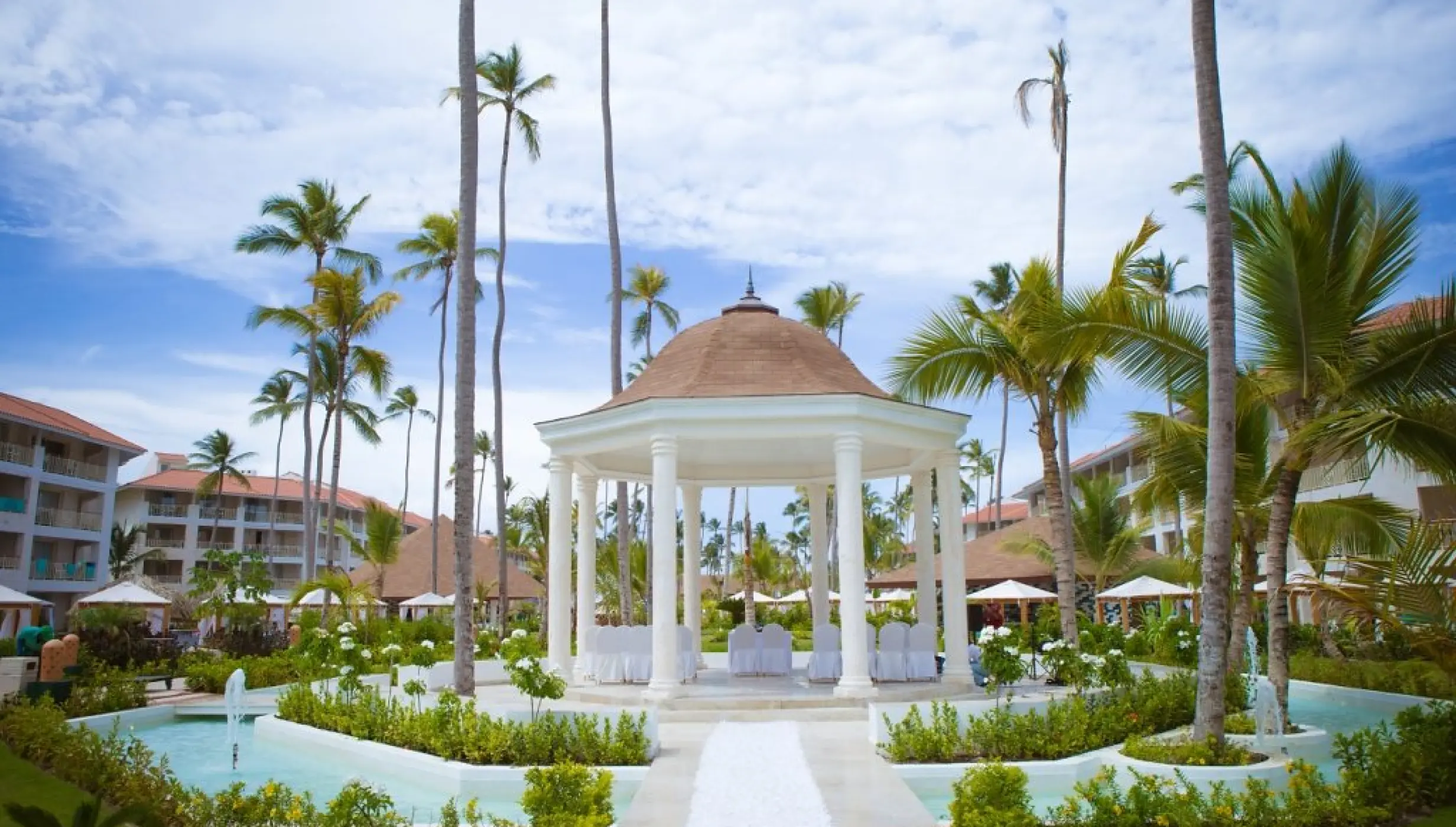 Garden gazebo wedding ceremony setup at Majestic Mirage, Punta Cana