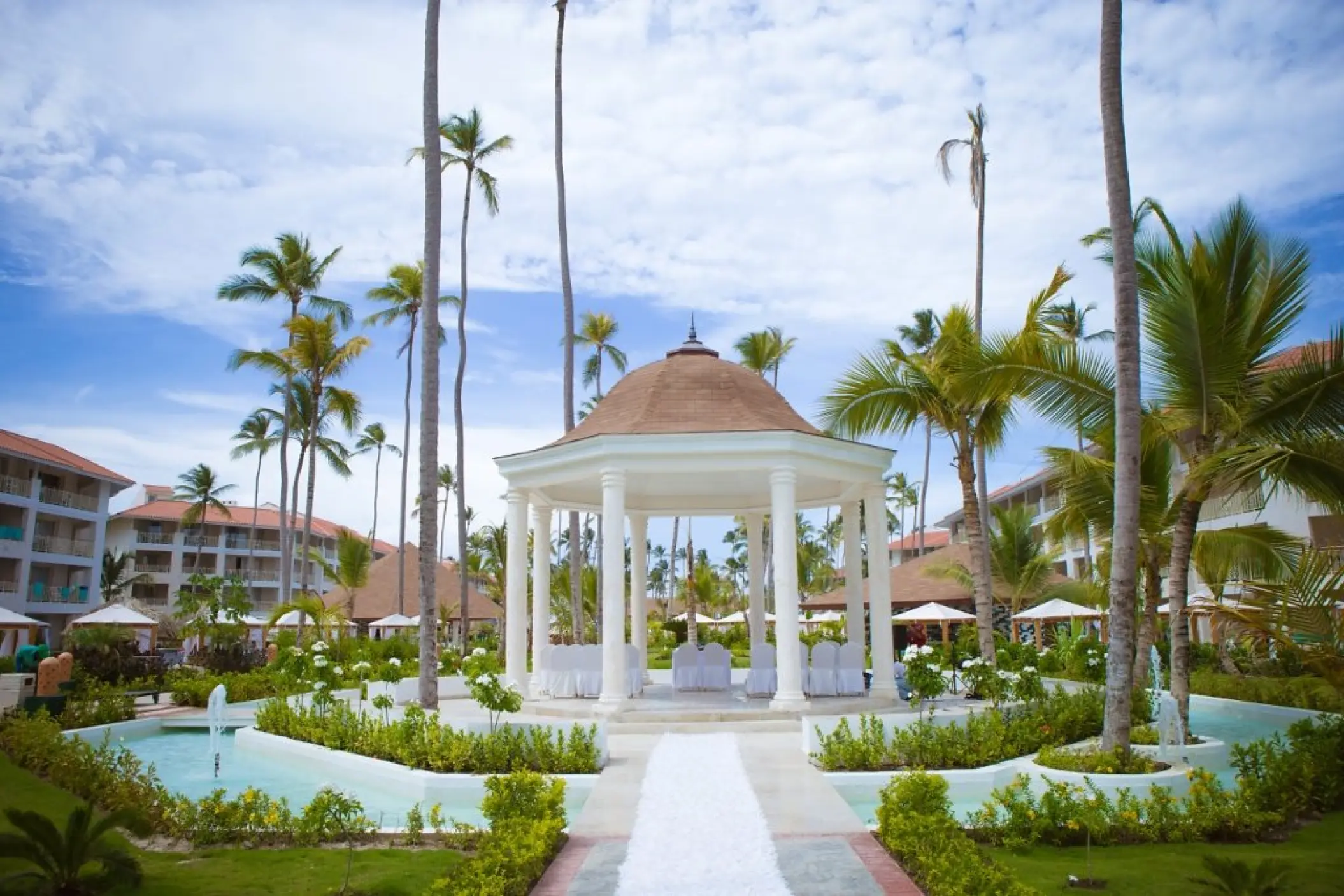Garden gazebo wedding ceremony setup at Majestic Mirage, Punta Cana