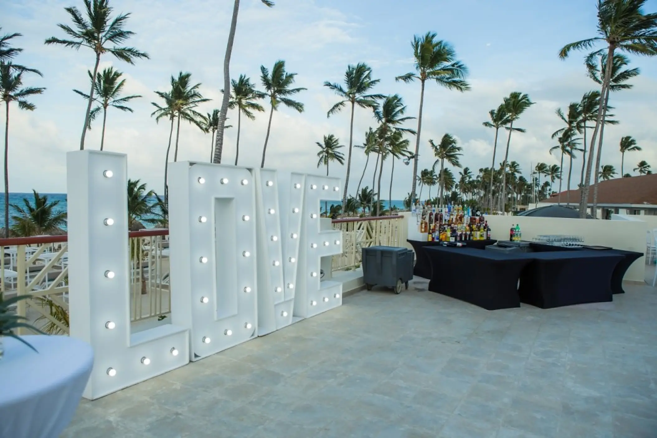 Marquee LOVE sign at a private terrace wedding reception, Majestic Mirage Punta Cana