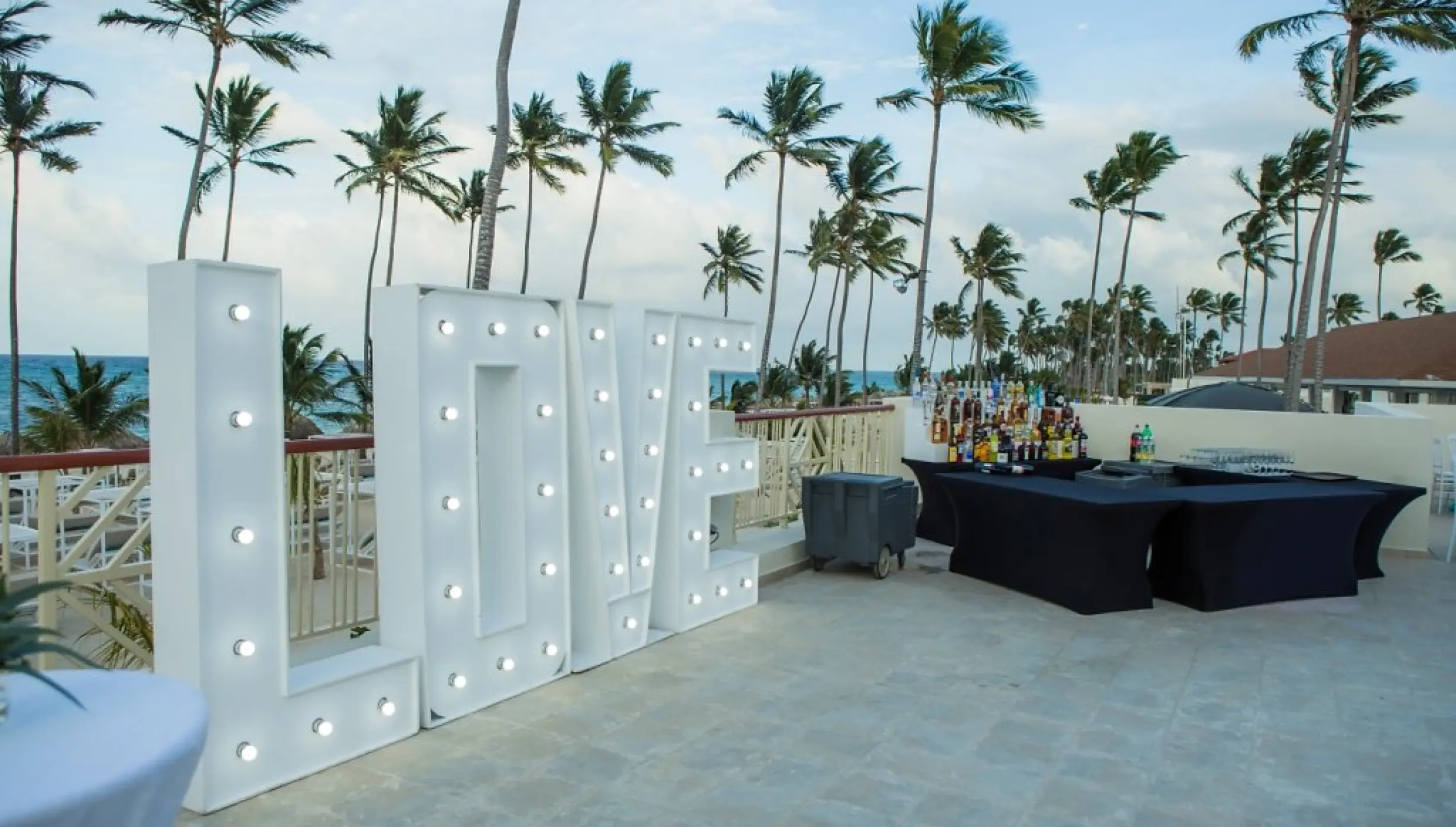 Marquee LOVE sign at a private terrace wedding reception, Majestic Mirage Punta Cana