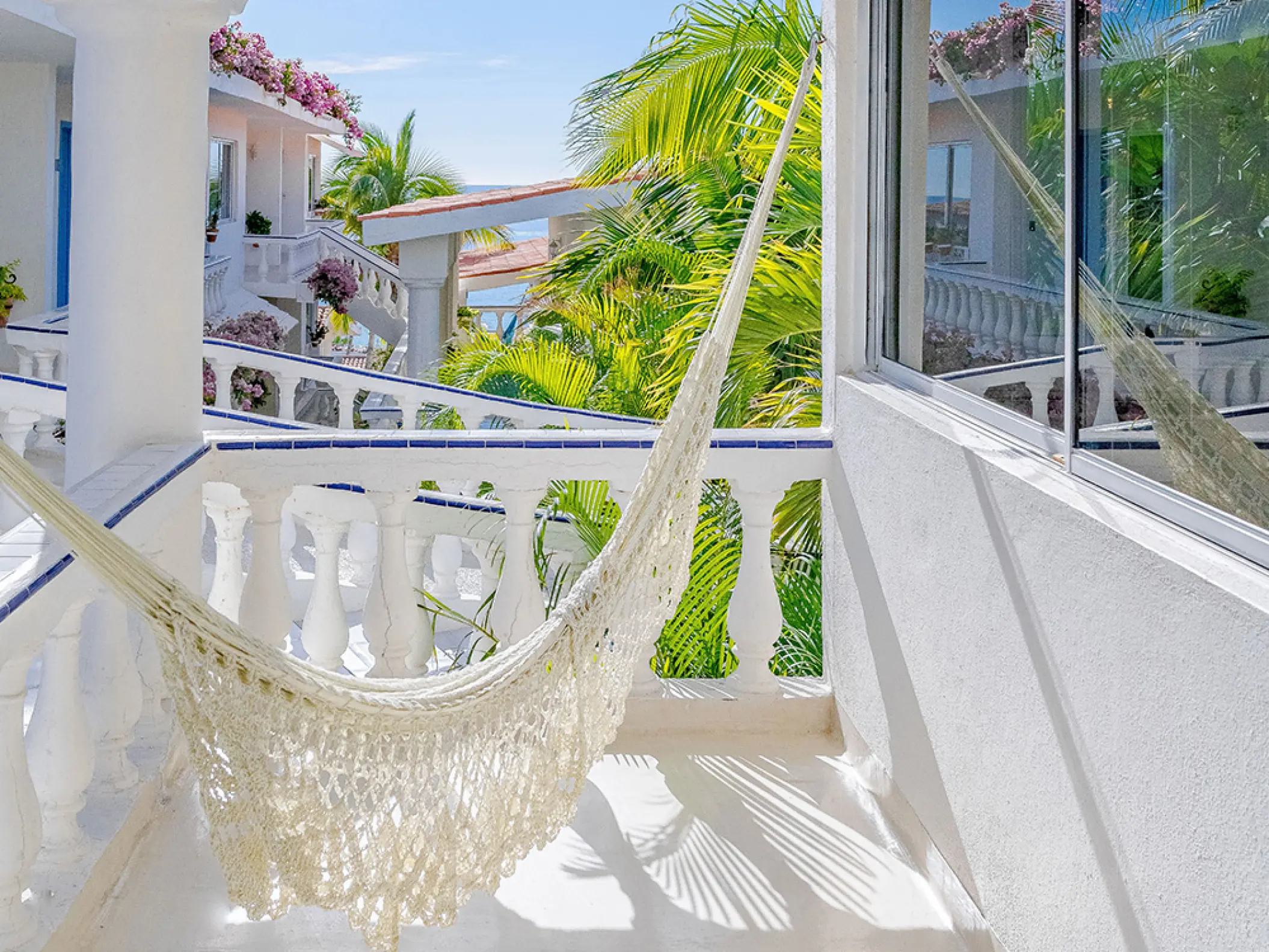 White woven hammock on a private balcony at Mar Del Cabo, Cabo San Lucas