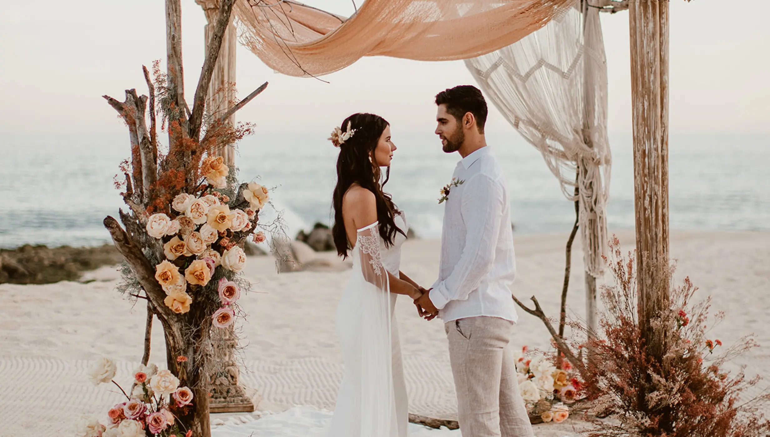 Couple on the beach at Mar del Cabo by Velas Resort
