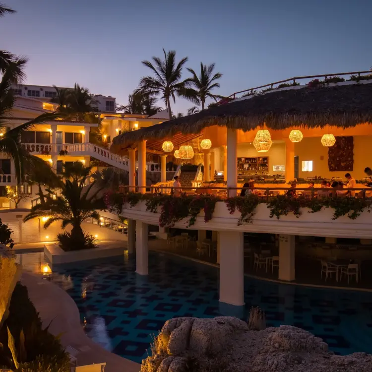 Mar Del Cabo terrace restaurant and pool at night, Cabo San Lucas