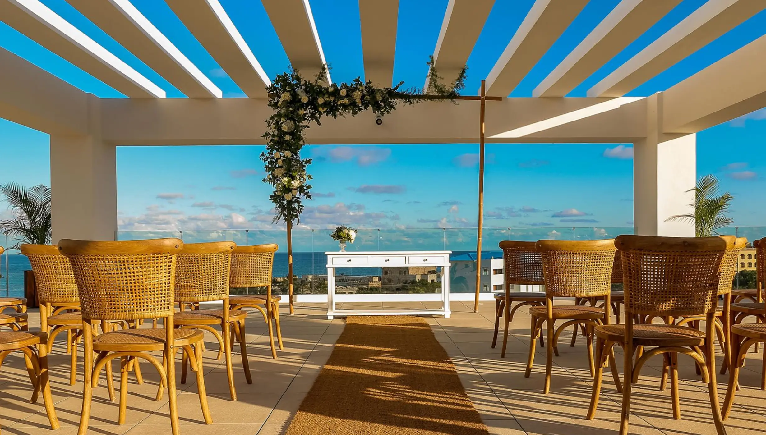 Sky terrace wedding ceremony setup with ocean views at Margaritaville Island Reserve Cap Cana, Punta Cana