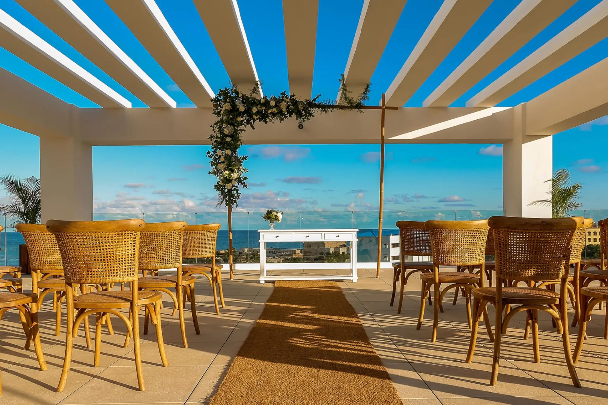 Sky terrace wedding ceremony setup with ocean views at Margaritaville Island Reserve Cap Cana, Punta Cana