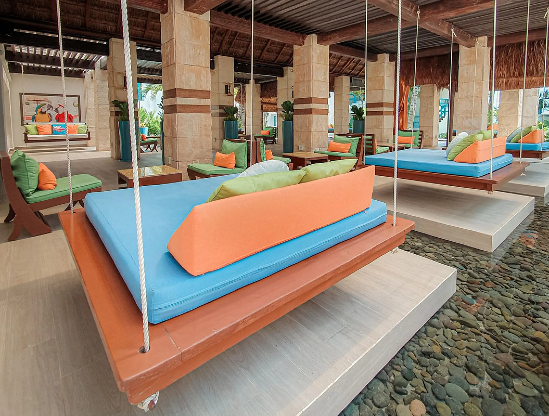 Hanging daybeds in the lounge area at Margaritaville Island Reserve Riviera Cancun, Cancun