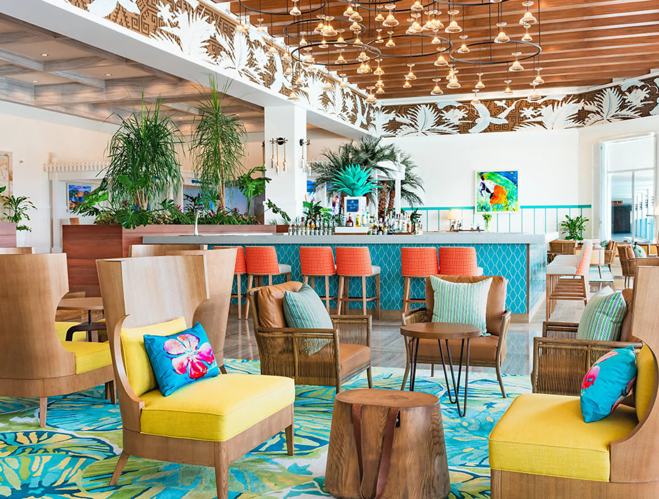 Salted Rim bar and lounge with vibrant tropical decor at Margaritaville Riviera Maya