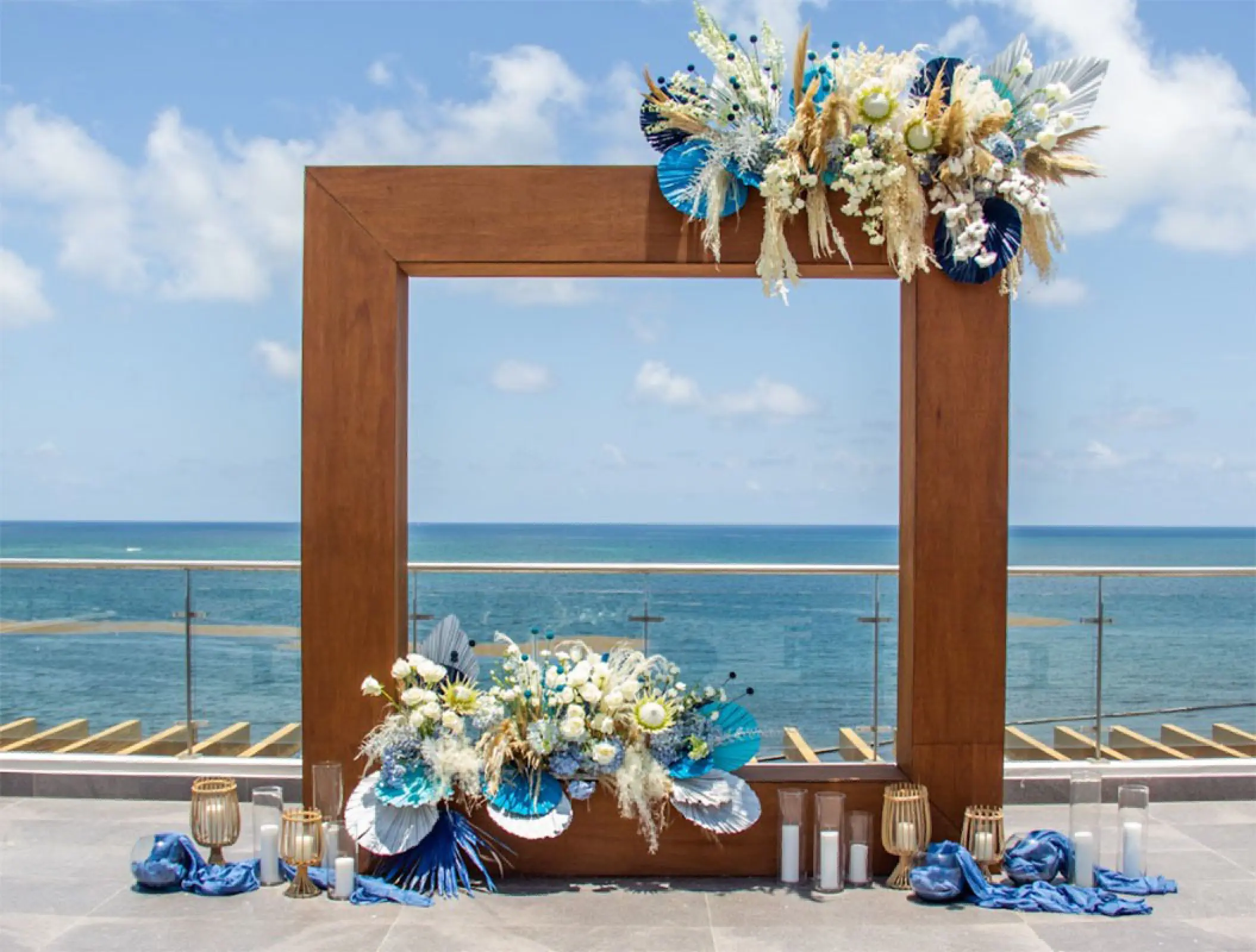 Sky Wedding venue ceremony arch overlooking the ocean at Margaritaville Island Reserve, Riviera Maya