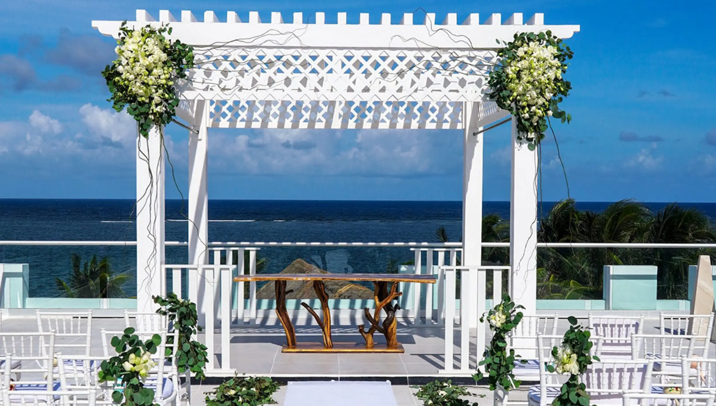 Ceremony decor in Sky Wedding at Margaritaville Island Reserve Riviera Cancun.