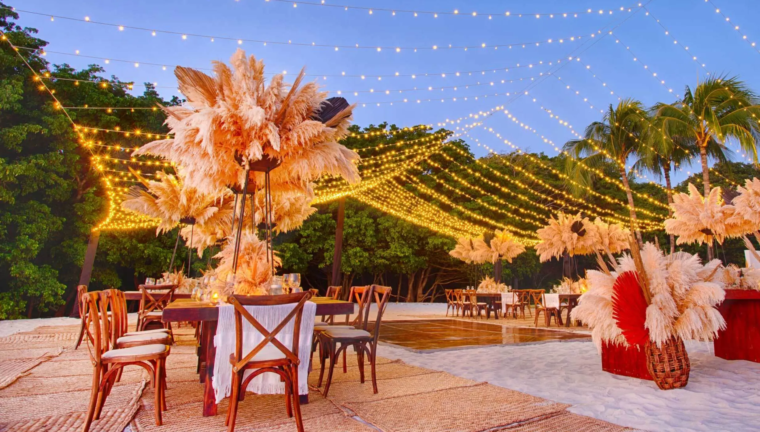 dinner reception on the beach at Marival Armony Luxury Resort & Suites