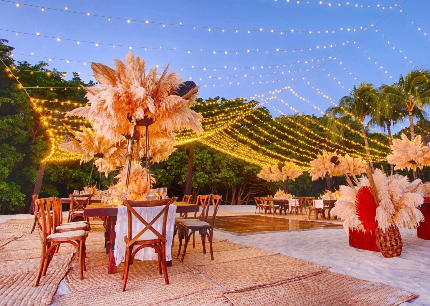 dinner reception on the beach at Marival Armony Luxury Resort & Suites