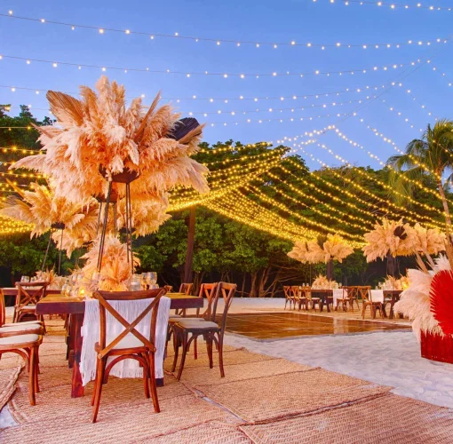 dinner reception on the beach at Marival Armony Luxury Resort & Suites