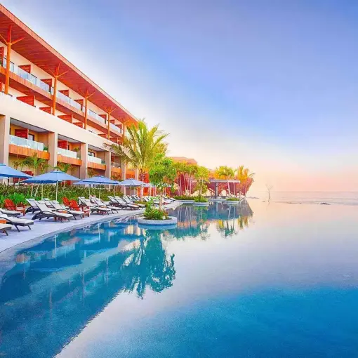 Infinity pool and lounge chairs at Marival Armony, Puerto Vallarta