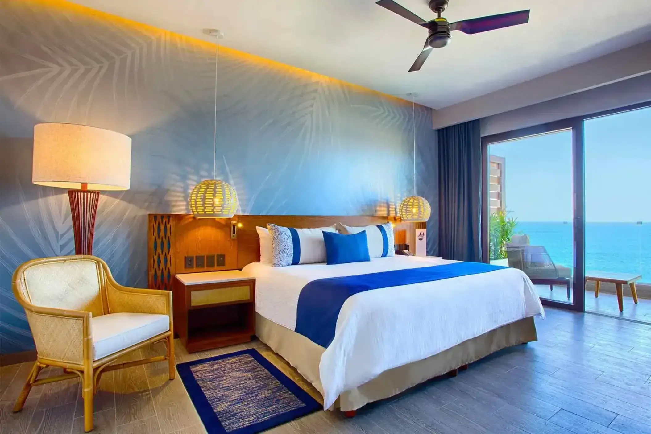 Modern suite with ocean view balcony at Marival Armony, Puerto Vallarta