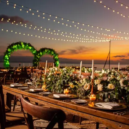 Beach wedding reception with string lights at Marival Armony, Puerto Vallarta