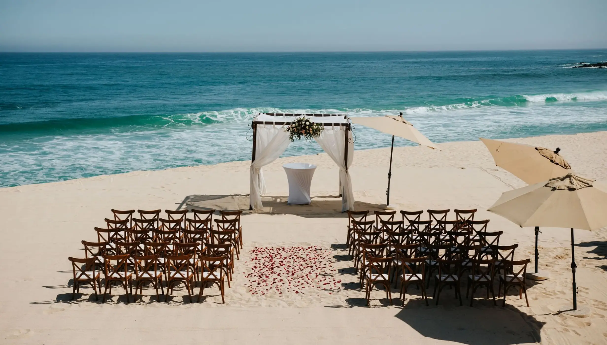 Ceremony decor on the beach venue at Marquis Los Cabos